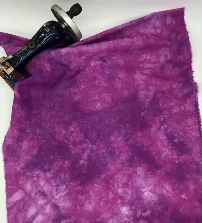 Amethyst purple hand dyed linen fabric with subtle hints of blue and medium to heavy mottling mottling giving lots of shades of the same color. Good for embroidery by hand or machine, quilting, wool applique backs and more!