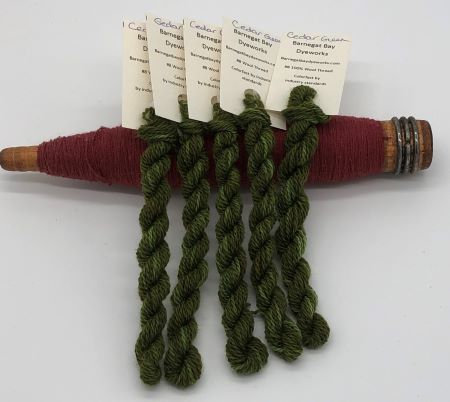 Hand dyed #8 wool thread in a variegated green for wool applique, hand embroidery and more.