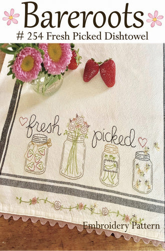 Fresh Picked Dishtowel Pattern has hand embroidered mason jars with flowers, pickles, strawberries and fireflies in them with the words 