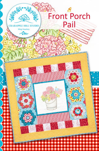 Front Porch Pail Pattern by Crabapple Hill Studio is a small wallhanging with pieced borders and hand embroidery center with a galvanized bucke, red geraniums and a small American flag.