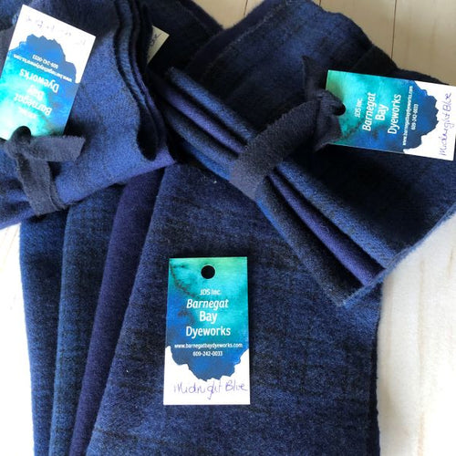 Four pieces of hand dyed wool in a medium dark blue, slightly lighter than our navy wool.