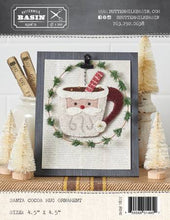Load image into Gallery viewer, Trim the tree with the perfect ornament! Decorate your tree or home during the holiday season with this  Santa Mug wool applique ornament, that is quick to make, and great to give as a gift!
