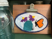 Load image into Gallery viewer, Small oval wool applique mat or hanging of a Ball mason jar, purple coneflowers and a orange and black butterfly. 
