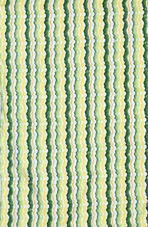 Pretty wavy stripe in greens, yellows and white from QT Fabrics