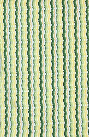 Pretty wavy stripe in greens, yellows and white from QT Fabrics