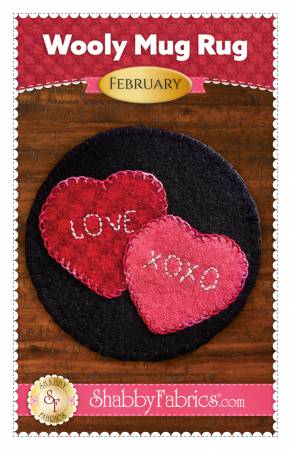 Pattern for a wool applique mug rug with hearts.