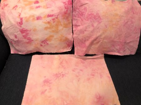 Hand dyed fabrics - cotton, linen and flannel - in warm pinks with hints of orange.