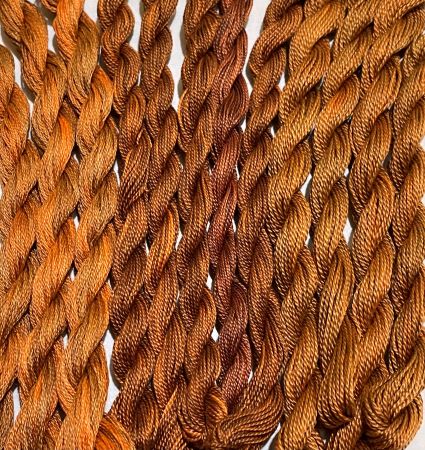 Hand Dyed Threads in Russet - more brown than orange - in floss, #12 and #8 pearl cottons.