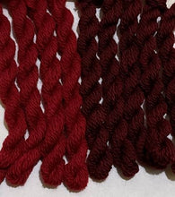Load image into Gallery viewer, Hand dyed wool threads with Strawberry Wine on the left and Cherry Wine on the right, for wool applique, crewel work or any hand stitching where a softer thicker thread is desired.
