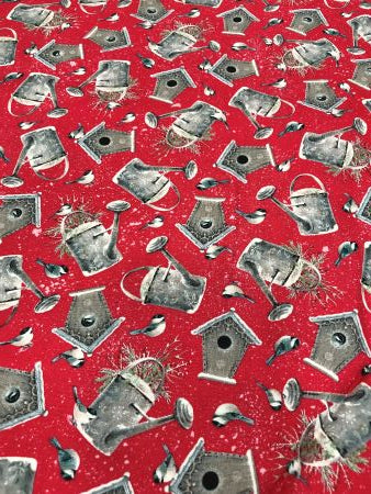Chickadees, watering cans and birdhouses on a red background from Quilting Treasures