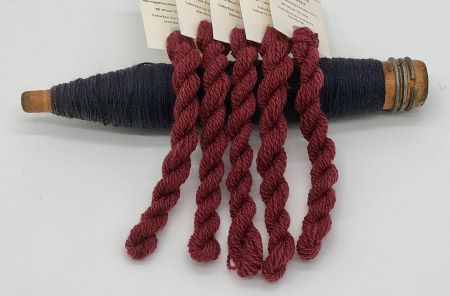 A deep, darker red, hand dyed wool thread for wool applique, crewel work, Sashiko or any hand stitching.