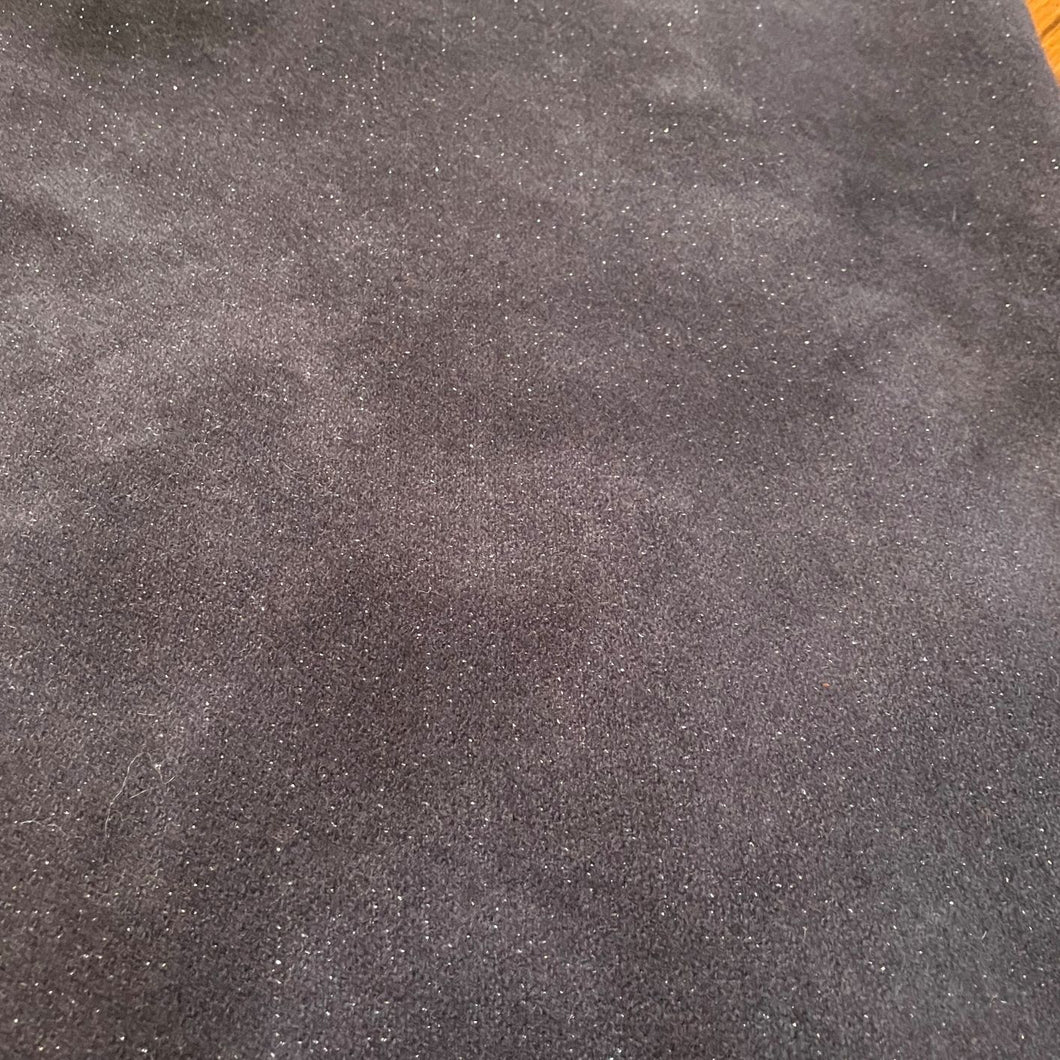Hand Dyed, mottled, black wool with silver sparkled threads woven in  97% wool 3% silver polyester 