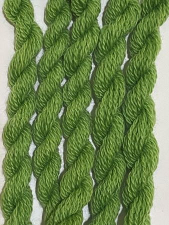 Hand dyed bright green with a yellow tone in #8 wool thread.  