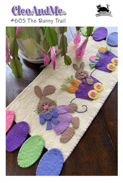 Wool Applique runner of a rabbit pulling her bunny and Easter Egg in a spring wagon