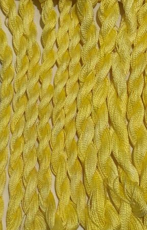 Hand dyed threads in a soft, warm yellow in floss and #12 and #8 pearl cotton.