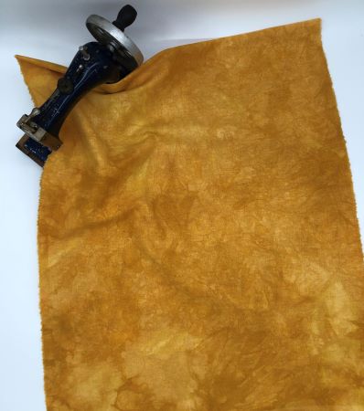 Hand dyed linen is a soft butterscotch candy color with delicious mottling.