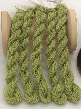 Hand dyed, this wool thread is a light medium green with a slight hint of yellow perfect for wool applique.