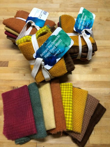 Bundles of 8 hand dyed wool in the reds, yellows, creams and golds of Chrysanthemums.