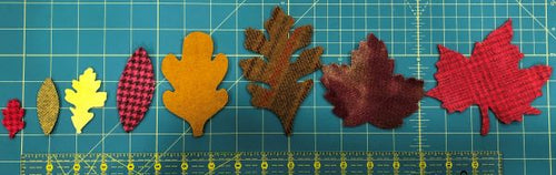 Eight sizes of pre-cut , felted wool leaves in assorted Fall colors, Mostly hand dyed.
