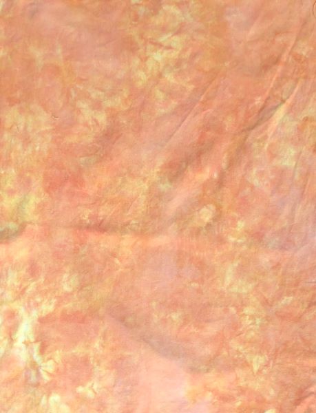 Hand dyed flannel in orange with with yellow and pink mottling 