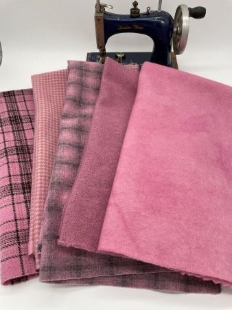 Hand dyed wool bundle of four textures and one solid in a dusky pink colorway.  Great for wool applique or rug hooking