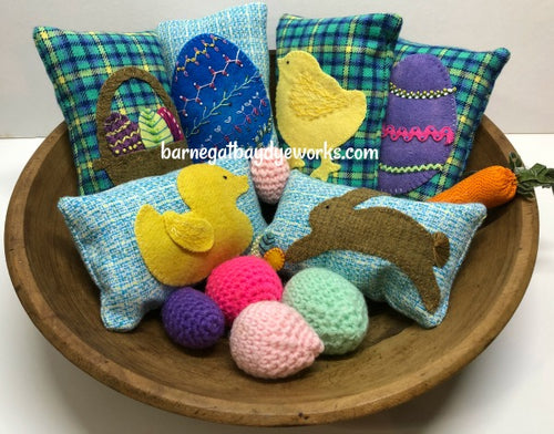 Wooden bowl with brightly colored flannel plaids  (teal, navy yellow, light teal) and hand dyed wools in blues, purples yellows , pinks and browns make up this set of 6  rectangular, Easter/Spring Bowl Fillers with a rabbit, duck, chick, Easter Egg and basket.