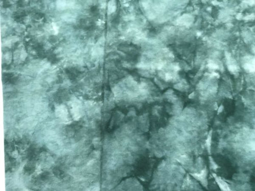 A mottled hand dyed flannel in a medium dark green.