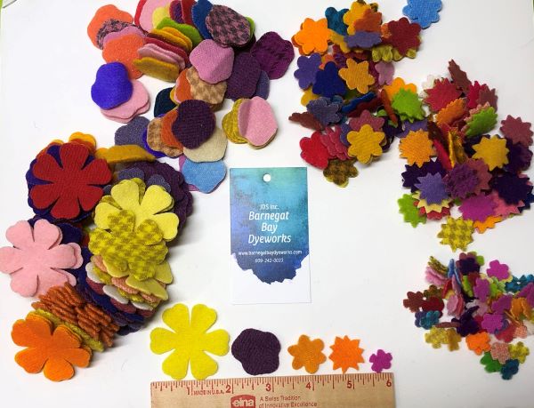 Die cut felted wool flowers shown in five sizes and shapes.  These are the largest size shown, 2 1/4