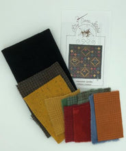 Load image into Gallery viewer, Shown is the pattern cover and all wools to complete the top of this wool applique project.  Wools are hand dyed with the exception of the black background.
