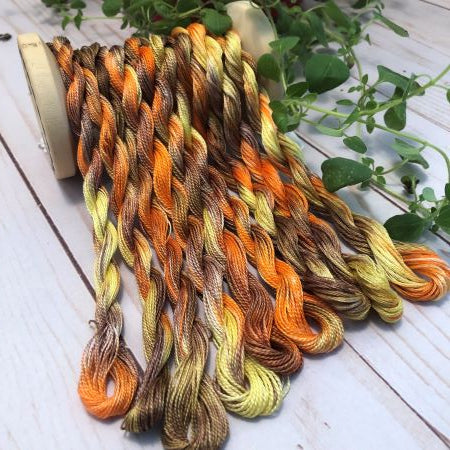 Hand Dyed floss, #12 and #8 pearl cotton threads in yellow, orange and brown - the colors of Indian Corn.
