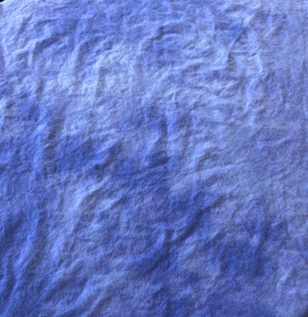 An unironed, hand dyed, cotton flannel dyed in a mottled lavender purple.