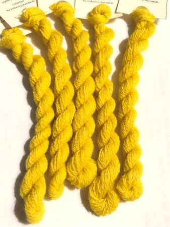 Skiens of hand dyed lemon yellow wool thread for wool applique