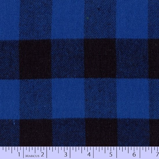 Cotton flannel Buffalo Plaid fabric from Marcus in alternating stripes of light blue and dark blue and dark blue and black squares.