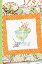 Load image into Gallery viewer, Pattern cover for hand embroidered margarita drink in a blue glass with straws, fruit on a stitch, a slice of lime and a paper drink umbrella at the base of the glass.
