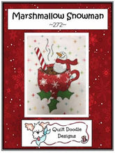 Load image into Gallery viewer, Applique pattern cover of a cup of cocoa with a marshmallow snowman and a candy cane in it all sitting on a sprig of holly.  
