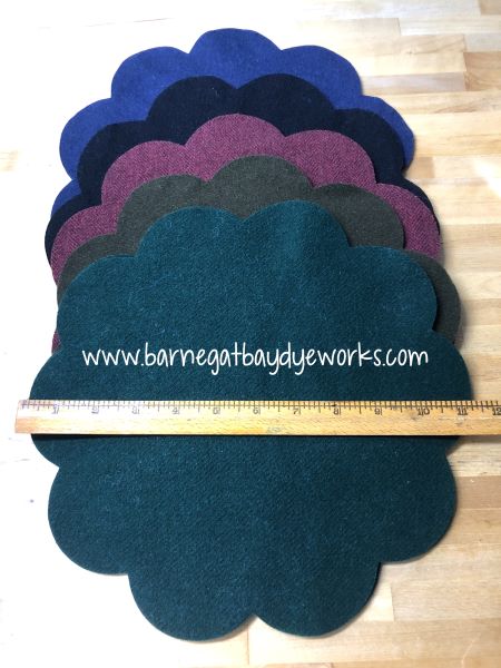 Scalloped wool mats for applique in blue, navy , red, brown and dark green.