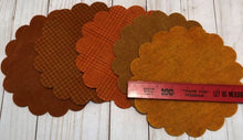 Load image into Gallery viewer, Orange hand dyed wool scalloped mats for wool applique in five textures.
