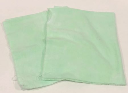 A mint green hand dyed flannel for wool applique backgrounds and backings