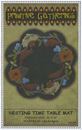 Pattern cover of a wool applique scalloped mat with birds feeding babies in a nest by a birdhouse circling the outside of the mat.  Nesting Time Table Mat by Primitive Gatherings