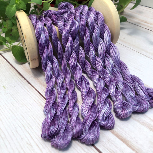 Hand dyed Purple Crush variegated threads with hints of blue for wool applique and any hand stitching.