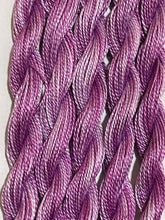 Load image into Gallery viewer, Lighter version of hand dyed #12 pearl cotton Purple Thread 
