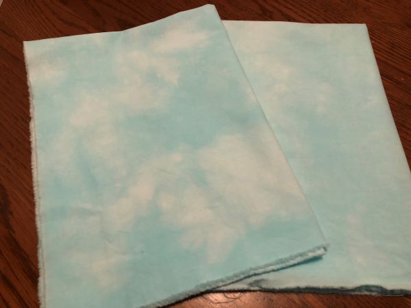 Mottled hand dyed cotton fabrics in robin egg blue.