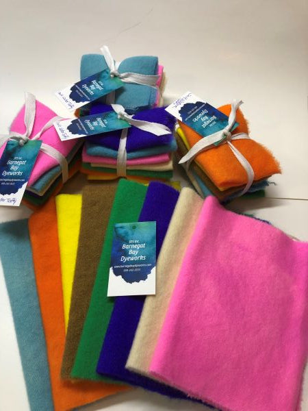 Eight hand dyed, 100% wool in bright, happy, salt water taffy colors/flavors of  root beer, blueberry, orange, lemon, cotton candy, lime, vanilla and grape! 
