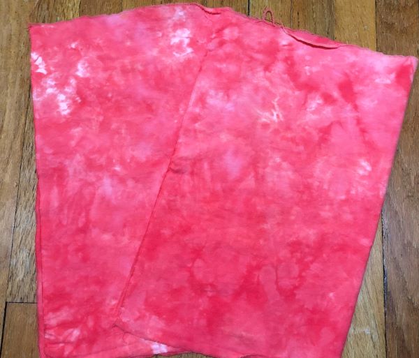 A light red to medium red hand dyed flannel m with lt to dark mottling