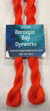 Load image into Gallery viewer, Skeins of hand dyed cotton floss in a bright Halloween orange.
