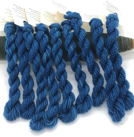 This wool thread is hand dyed in small batches a deep blue for wool applique and hand stitching.