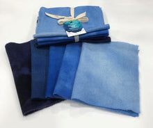 Load image into Gallery viewer, Five hand dyed wool pieces in blues from dark to light representing a winter sky.  Good for wool applique.  Bundle 1
