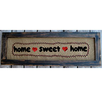 Home Sweet Home Kit by Plays With Wool with wool applique letters and hearts .